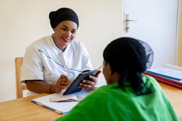 Doctor with patient Rwanda