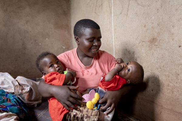 Mother with babies in Rwanda