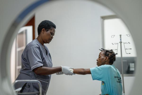Doctor with patient in Rwanda