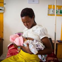 Mother with twin babies in Rwanda