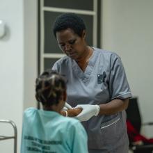 Doctor with patient in Rwanda